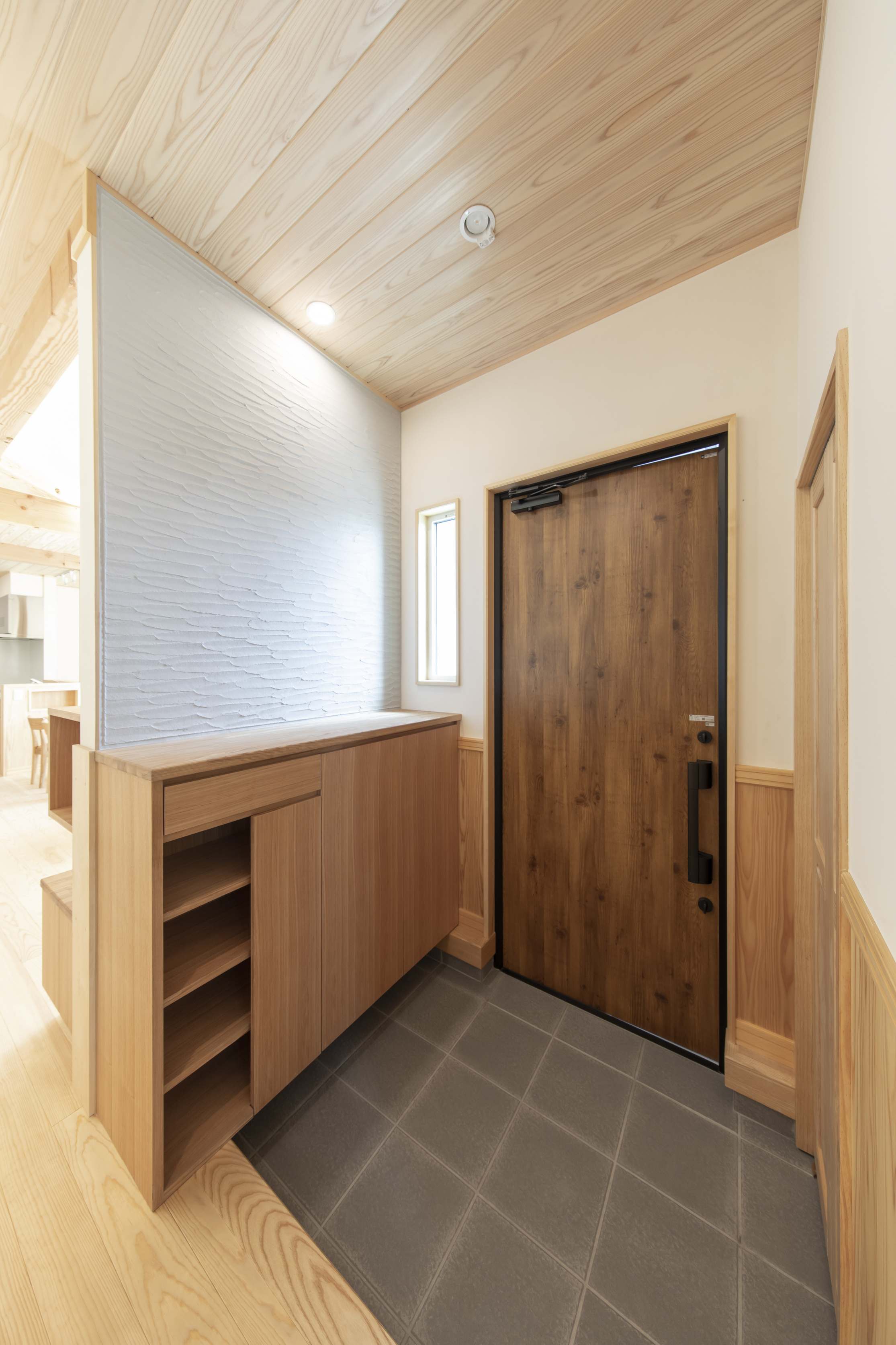 自然素材で統一された機能と美しさを両立する住まい - photo 11